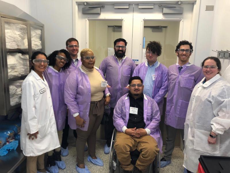 NextGen Leaders wear lab coats for a group photo