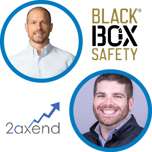 Jackson Dalton, a white veteran man with a white button down, of Black Box Safety, and Corey Axelrod, a white Deaf man with short brown hair smiles, of 2Axend.