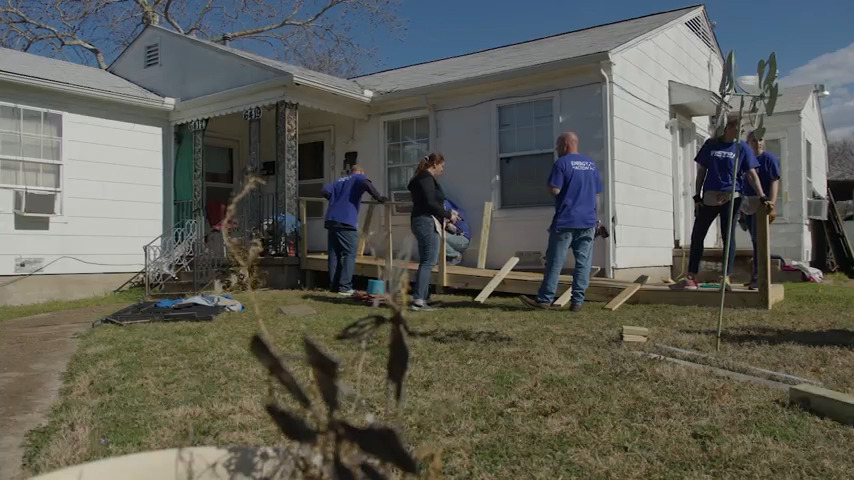 Vistra Employees building ramps outside a house.