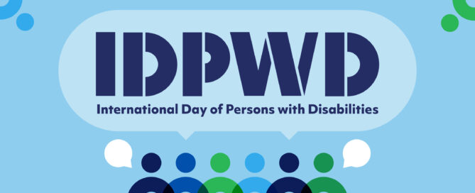 IDPWD in navy stencil design with phrase "International Day of Persons with Disabilities" underneath. Light blue speech bubble with blue and green simplistic silhouettes underneath and in corners.