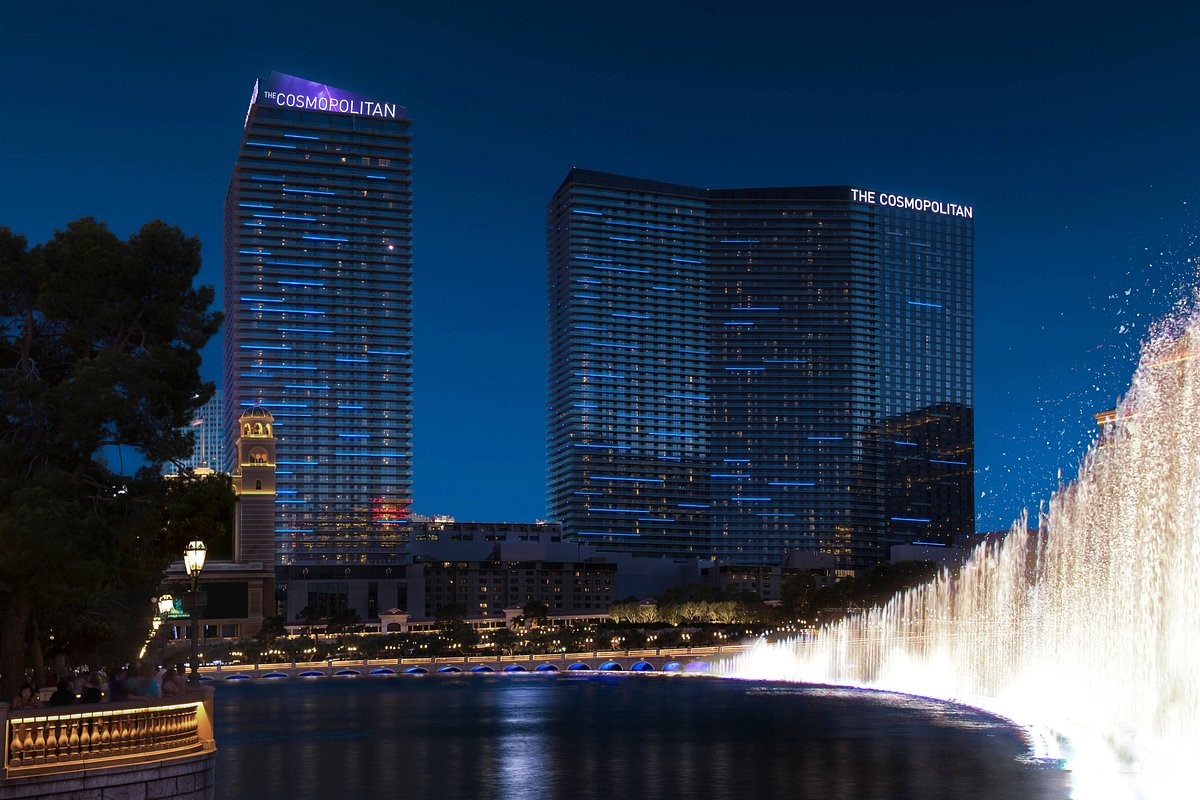 Cosmopolitan Hotel in Las Vegas. Two large buildings in front of a water fountain.